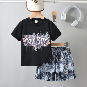 Boys&apos; urban street style outfit trend with colorful ink graffiti T-shirt + camouflage shorts set